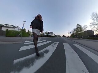 Walking on the street in sheer skirt